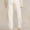 Cream Women’s Ralph Lauren Logo & Wave Graphic Fleece Sweatpants Cream Women’s Ralph Lauren Logo & Wave Graphic Fleece Sweatpants